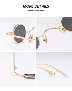 Detail view of steampunk round sunglasses with metal frame, nose pads, and hinges