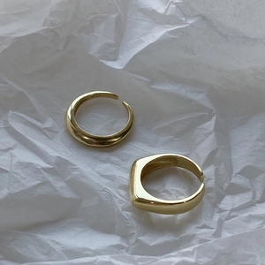 Detail of S925 sterling silver gold plated rings with inner stamp and smooth finish