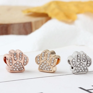 DIY animal paw print beads with rhinestones in rose gold, gold and silver finishes