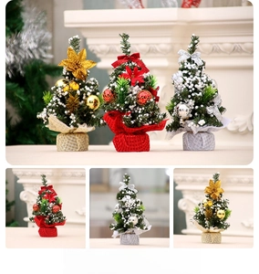 Detailed view of mini Christmas trees with sequined bases and colorful festive ornaments