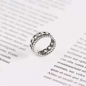 Macro shot of silver S925 double-layer geometric chain ring with vintage texture