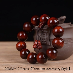 Macro detail of high-density 20mm sandalwood prayer beads with polished wood grain