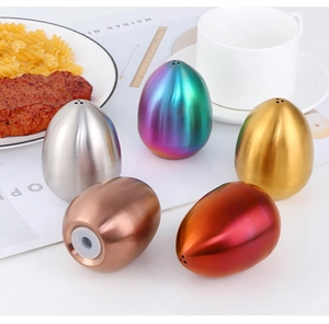 Detailed top view of egg-shaped spice shakers in gold, silver, rose gold and rainbow finish