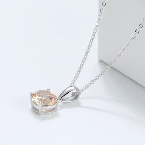 Macro view of champagne zircon pendant necklace with 925 silver four-prong setting