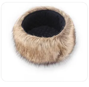Detail of winter faux fur trapper hat with black quilted lining for thermal warmth
