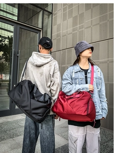Detail of waterproof nylon gym bag featuring separate wet and dry storage compartments