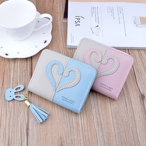 Short minimalist faux leather wallet for women with heart patchwork and bunny tassel