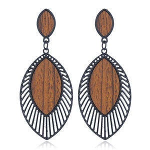Boucles d'oreilles vintage en bois en forme de feuille avec cadre en métal noir