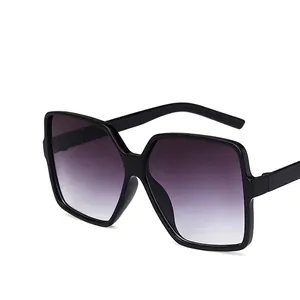 Classic square oversized sunglasses with black frame and purple gradient lenses