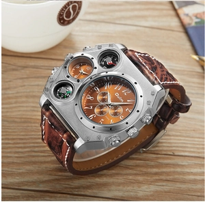 Detailed close-up of dual-time leather watch with large silver case on a wooden table
