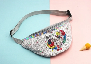 Macro view of sequined unicorn fanny pack with Magic lettering and laser trim details
