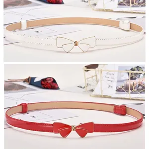 Women's slim leather belts with golden bow buckle in elegant white and vibrant red