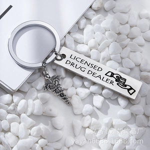 Stainless steel keychain with Licensed Drug Dealer engraving and medical caduceus charm