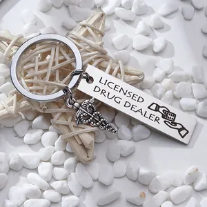Funny Licensed Drug Dealer keychain with medical caduceus charm in stainless steel