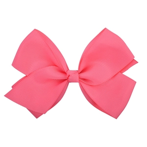 Detailed texture of a bright hot pink grosgrain ribbon hair bow with a central knot