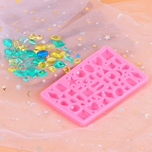 Pink silicone mold with heart and geometric shapes for DIY crystal resin jewelry making