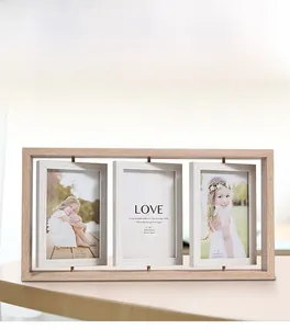 Detail of a rotating triple 4x6 inch wooden photo frame with natural light oak finish