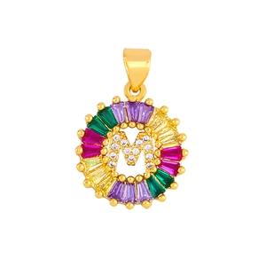 Close-up of golden letter M pendant with multicolored rainbow cubic zirconia inlay