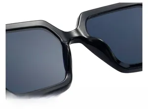 Macro detail of ergonomic integrated nose pads on black thick frame sunglasses