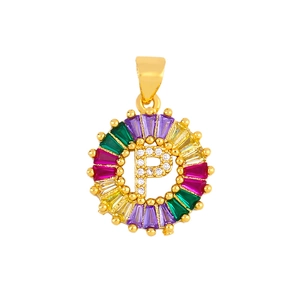 Close-up of golden letter P pendant with multi-colored gemstones and white crystals