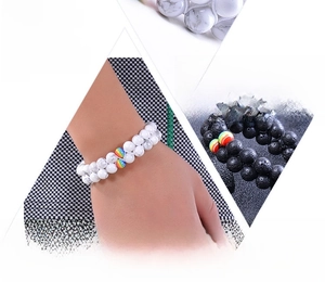 Detailed macro view of double-layer natural white turquoise and lava stone beaded bracelet
