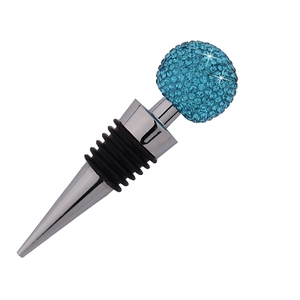 Detailed view of shiny blue crystal ball wine stopper with sparkling rhinestone finish