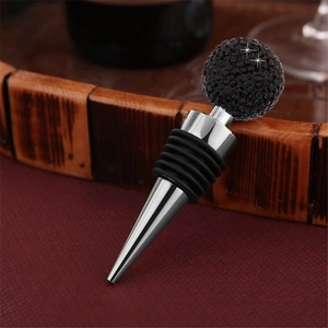 Macro view of black crystal ball wine stopper with polished zinc alloy and silicone seals