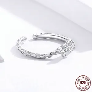 S925 sterling silver bow ring featuring vintage filigree patterns and adjustable open band