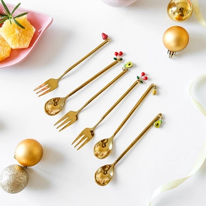 Golden stainless steel cutlery set with fruit charms including 3 forks and 3 coffee spoons