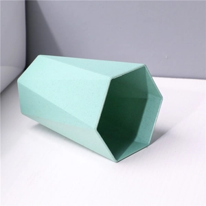 Diamond-shaped wheat straw mint green toothbrush cup with matte finish texture