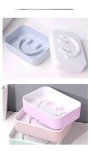 Close-up of smiley face hollow drainage holes on multi-colored double-layer soap boxes
