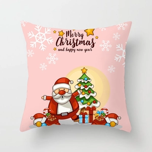 Detail of pink Christmas pillowcase with Santa Claus, Xmas tree and holiday motifs