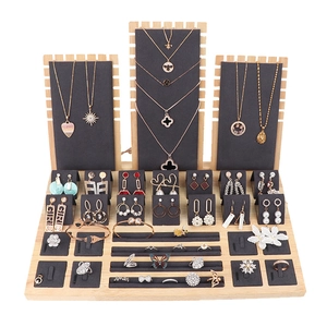 Wooden jewelry display stand set with grey velvet for necklaces, rings, and earrings