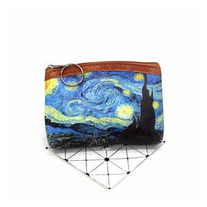 Detail view of the artistic Van Gogh Starry Night oil painting print on a canvas coin purse