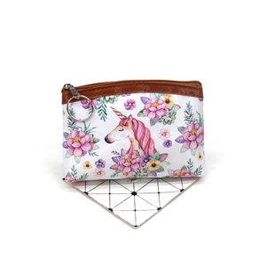 Detailed view of unicorn coin purse with floral pattern and secure silver metal zipper