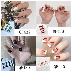 Detailed views of various 3D waterproof nail stickers in polka dot and rainbow styles