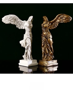 Detailed close-up of Winged Victory sculpture in white resin and bronze finishes