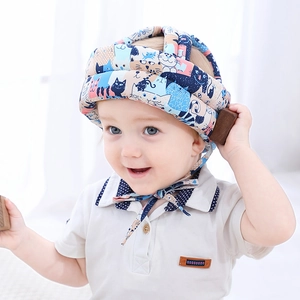 Protective infant safety helmet with blue cartoon cat pattern and adjustable chin strap