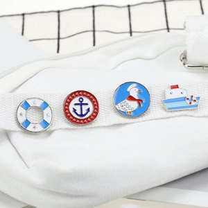 Set of four nautical enamel pins featuring lifebuoy, anchor, seagull, and steamship