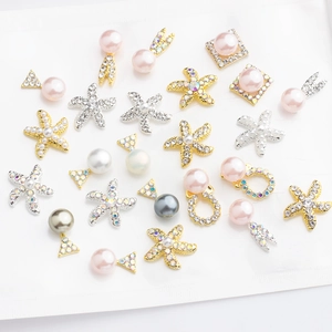 Japanese style alloy nail art charms with pink starfish pearls and crystals on white base
