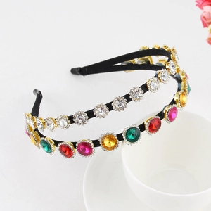 Detailed macro view of baroque headband with colorful rhinestones and faux pearls