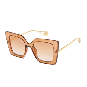 Fashionable oversized square sunglasses with amber gradient lenses and pearl metal temples
