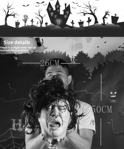 Detailed size view of scary latex severed head prop with black hair for Halloween decor