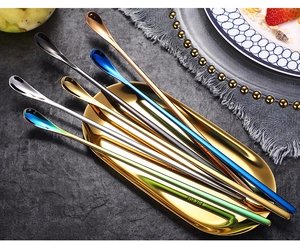 Detailed view of long handle 304 stainless steel spoons in five different metallic colors