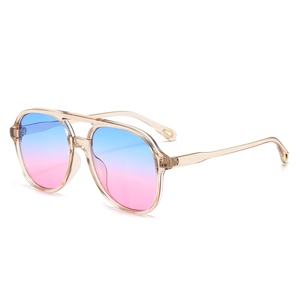 Classic double-bridge oval aviator sunglasses with champagne frames and gradient lenses