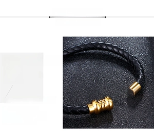 Detail of black braided leather bracelet with golden 316L stainless steel magnetic clasp