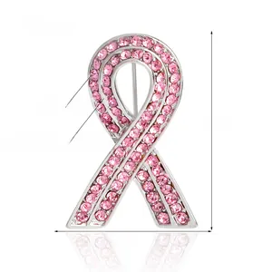 Close-up of pink ribbon brooch with inlaid rhinestones and detailed product dimensions