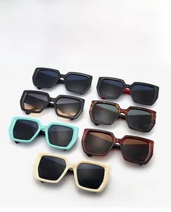 Detailed overhead view of multiple thick-frame rectangle sunglasses in diverse color options