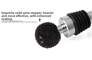 Macro detail of 304 stainless steel wine stopper with black crystal ball and rubber seals