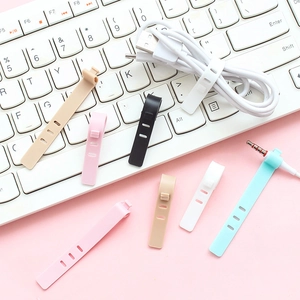 Silicone cable organizer ties for earphone and USB cables in various pastel colors